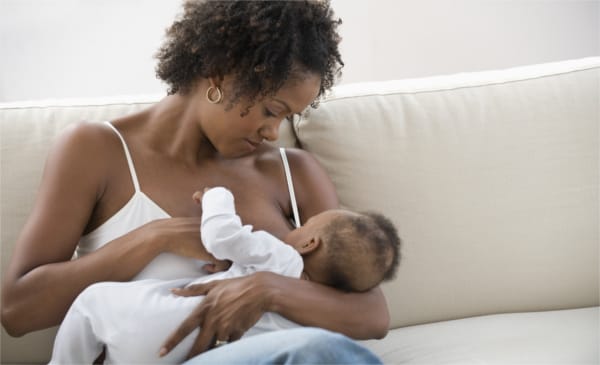 Mother breastfeeding baby