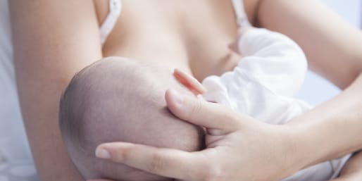 Mother breastfeeding baby