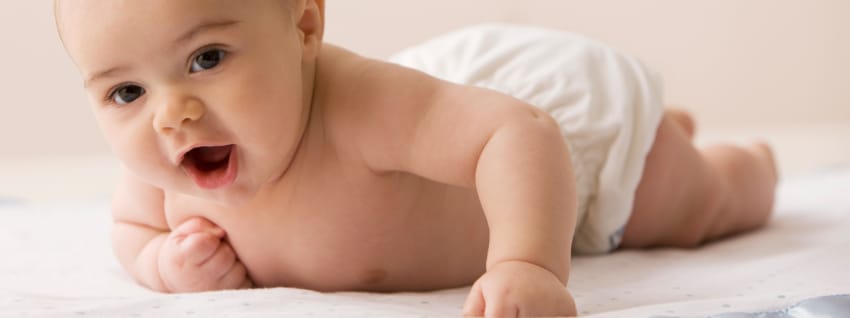 Baby lying on a towel