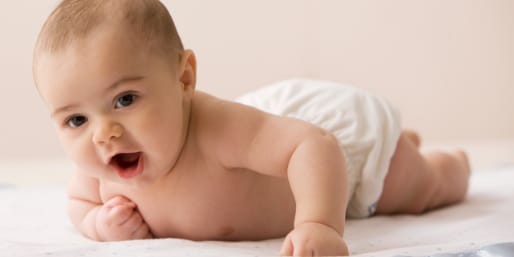 Baby lying on a towel