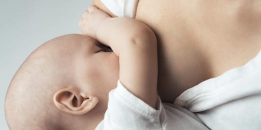 Mother breastfeeding baby