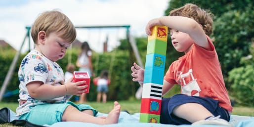 Toddlers playing in a park