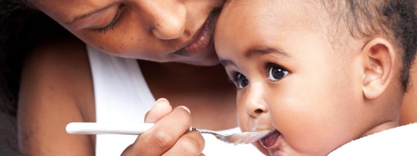 Mother feeding baby