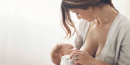 Mother breastfeeding baby