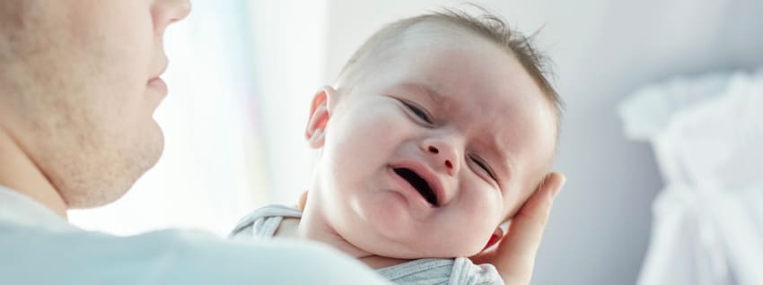 Healthcare Professional comforting baby