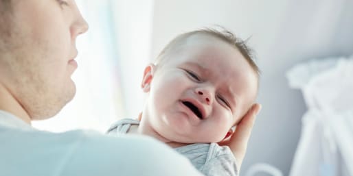 Healthcare Professional comforting baby