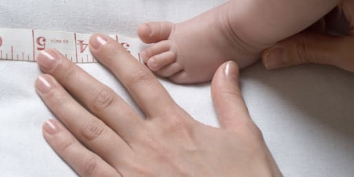 Measuring baby feet
