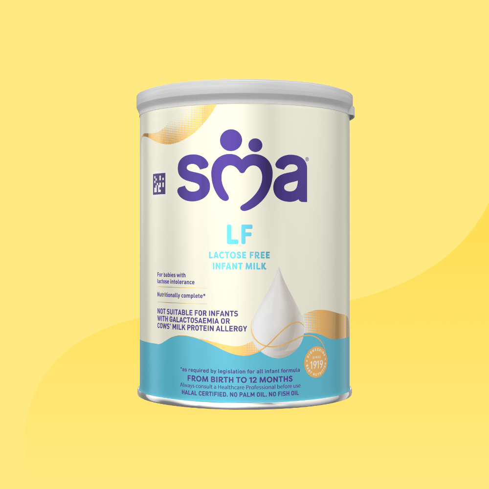 Tin of SMA LF Lactose Free Infant Milk Powder with a grey lid, in front of a yellow background 