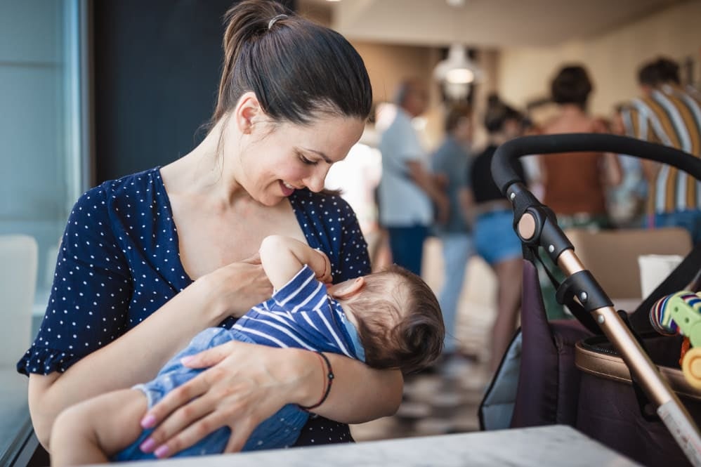 Mother breastfeeding baby
