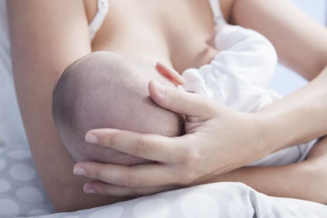 Mother breastfeeding baby