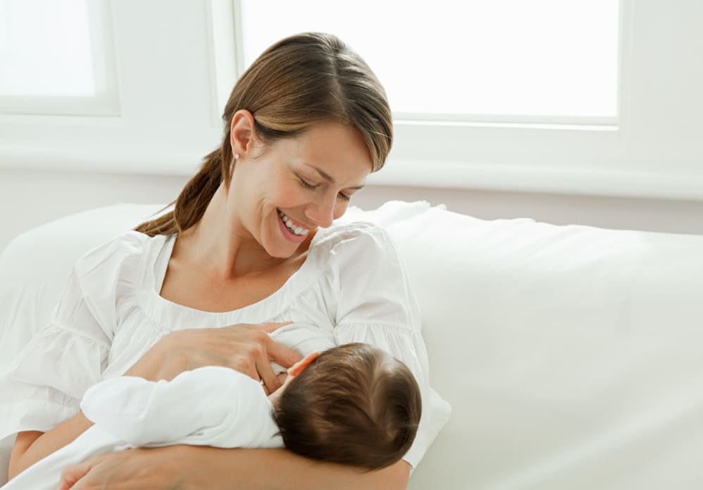 Mother breastfeeding baby