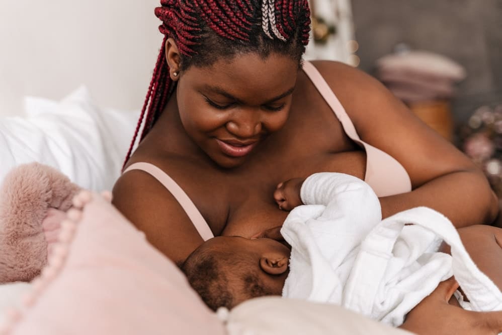 A mother breastfeeding her baby