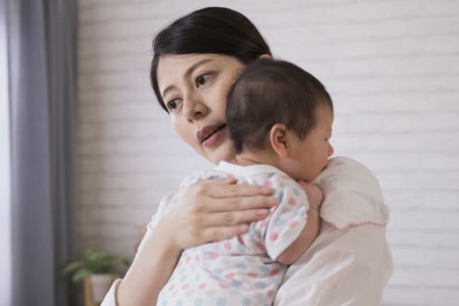 Mother soothing baby